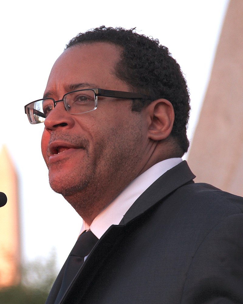 Michael Eric Dyson attending a candlelight vigil marking the 44th anniversary of MLK