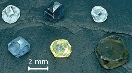 Lab-grown diamonds, which are about 2 mm wide.