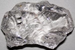 Conchoidal fracture demonstrated by quartz.