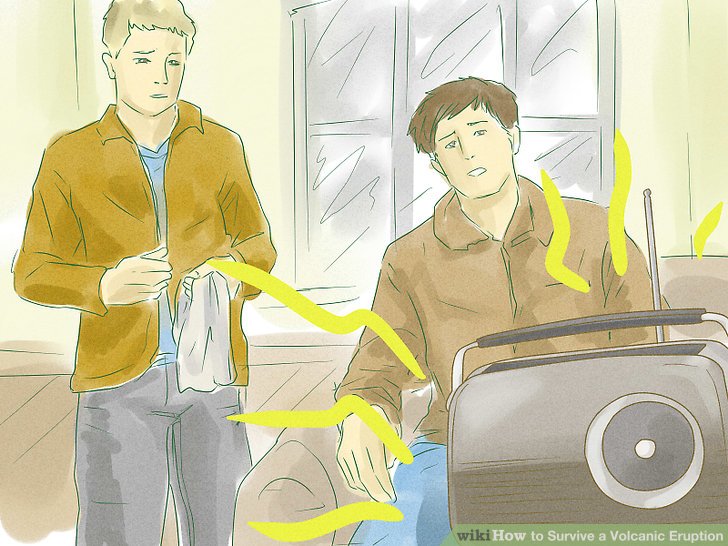 Two men listening for updates on a radio.