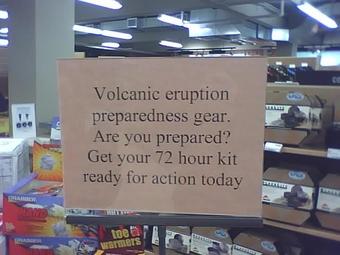 A sign posted in Alaska that says: "Volcanic eruption preparedness gear. Are you prepared? Get your 72 hour kit ready for action today