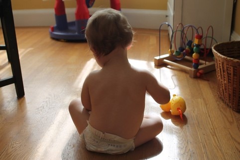 backview of infant sitting