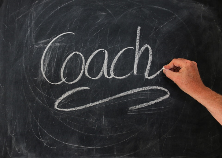 coach written on chalk board