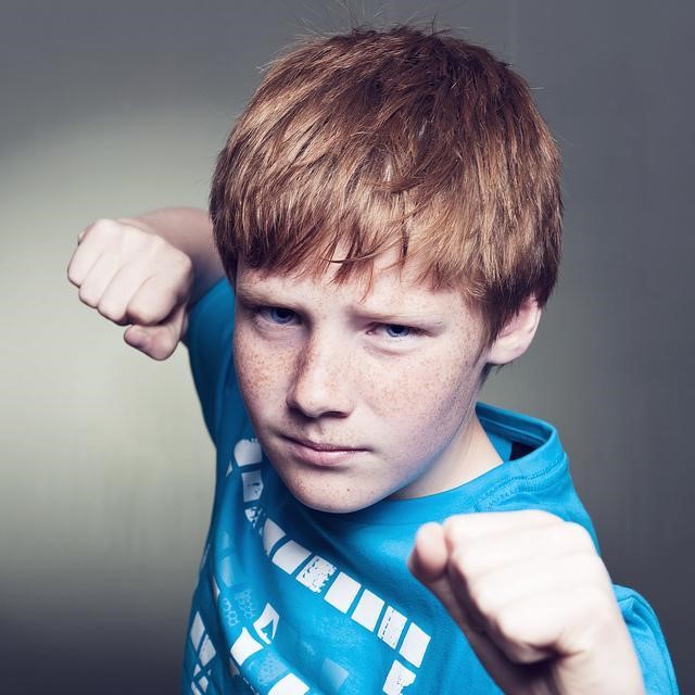 kid with fists out