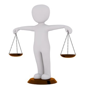 human figure at the center of a balance scale