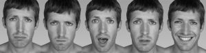 A photograph of a man displaying Ekman's 5 universal emotions