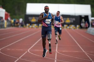 Athletes with prosthetic legs run during the 2016 Invictus Games.