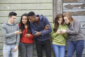 teenagers on phones