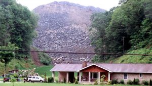 Photo of a mountain covered in rocks and waste from a coal mine.