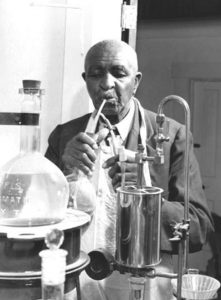 Photo of George Washington Carver working in a laboratory