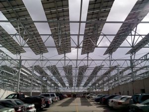 Photo of solar panels over a parking lot
