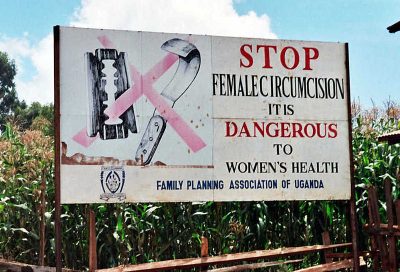 A road side sign in Nigeria advocating for the end of female genital mutilation.