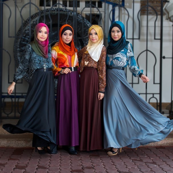 Four young women in native dress.