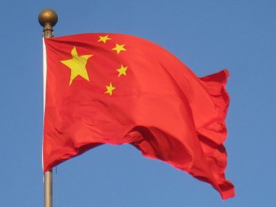 Chinese flag waving in the breeze.