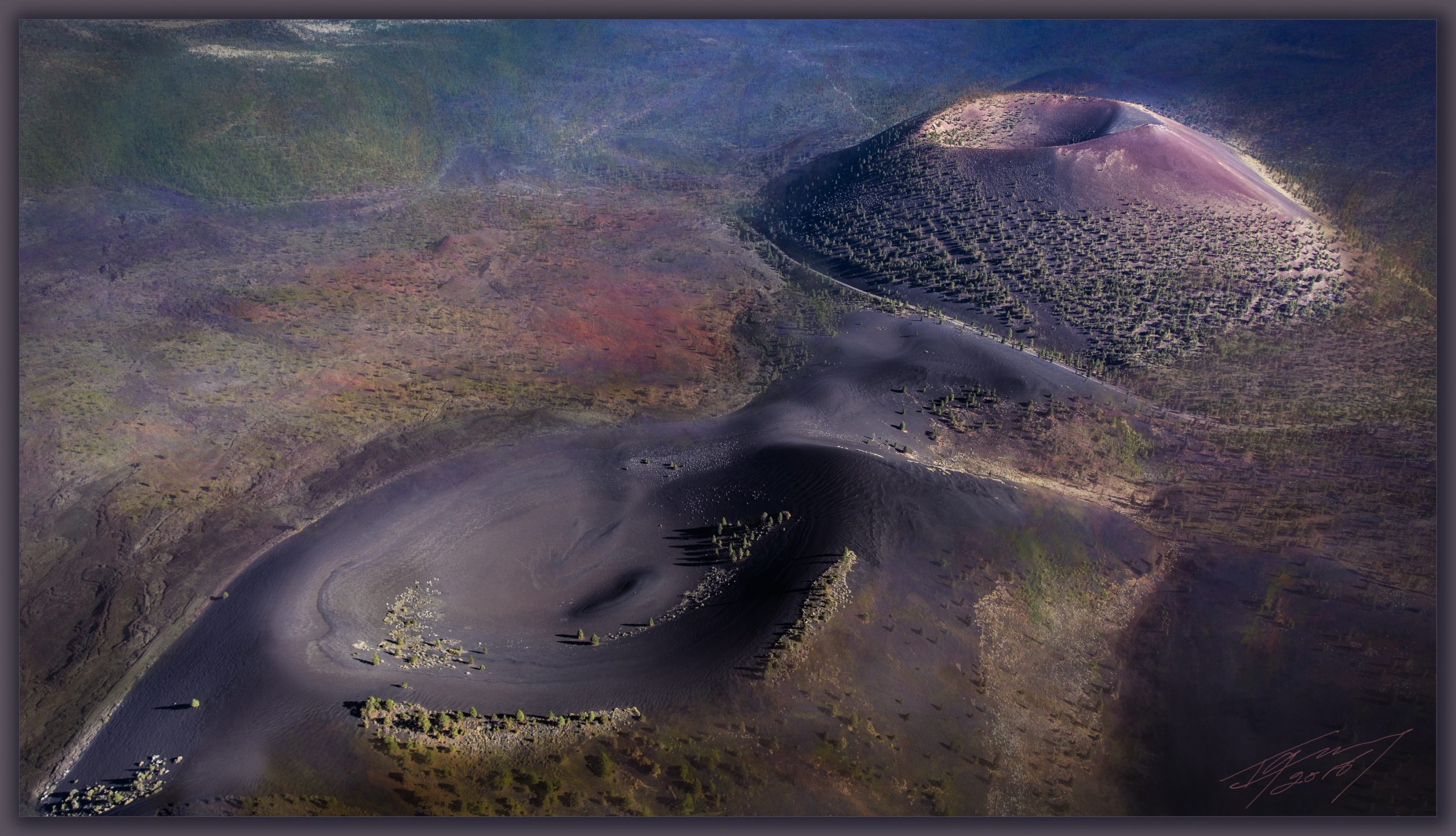 Two brightly colored cinder cone volcanoes (reds, grays, purples). Near the back is the larger Sunset Crater and toward the front of the image is an older unnamed cinder cone. Both are part of the San Francisco Volcanic Field of Northern Arizona.
