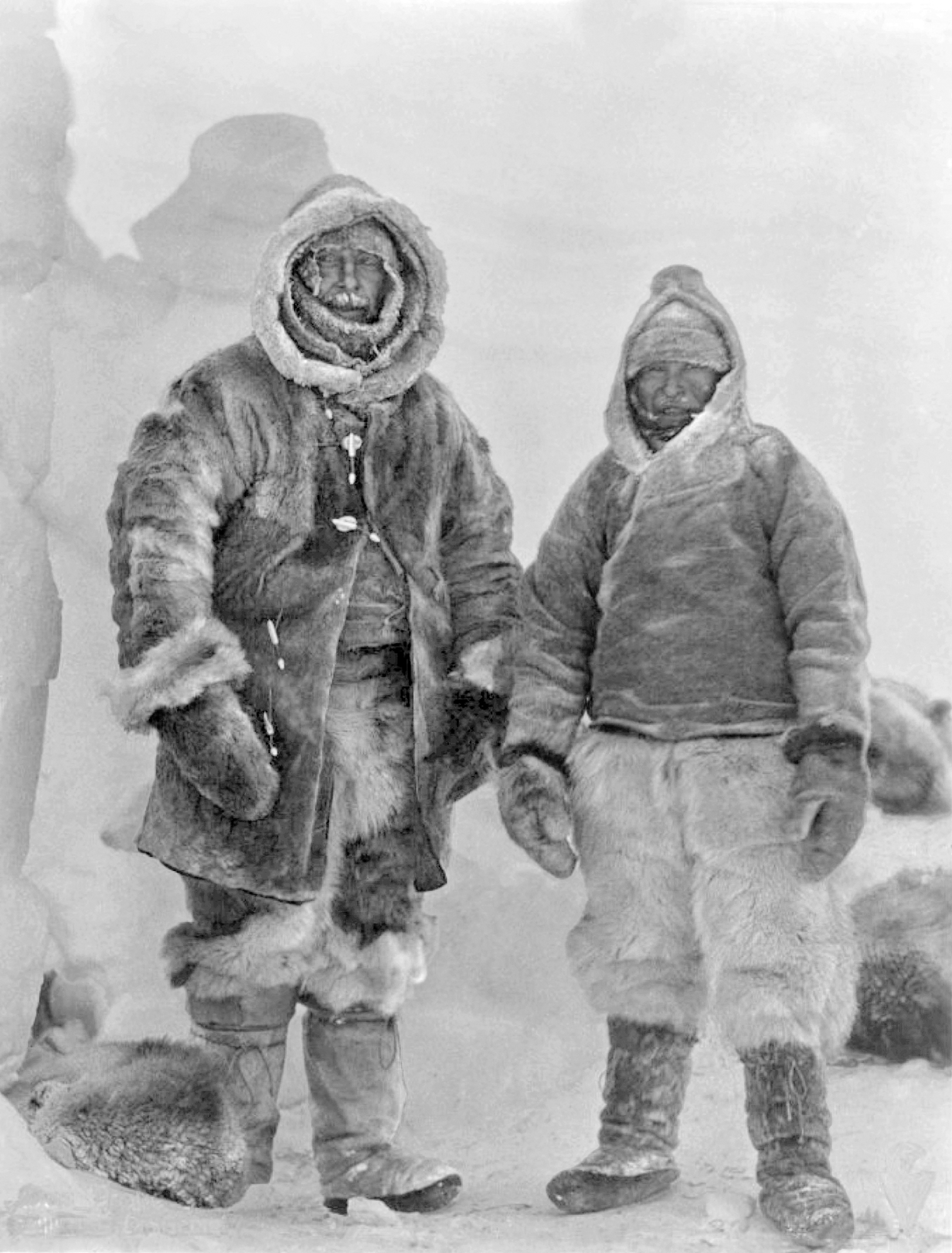 The last known image of Alfred Wegener in Greenland before his death. He is in a winter tundra in heavy coats.