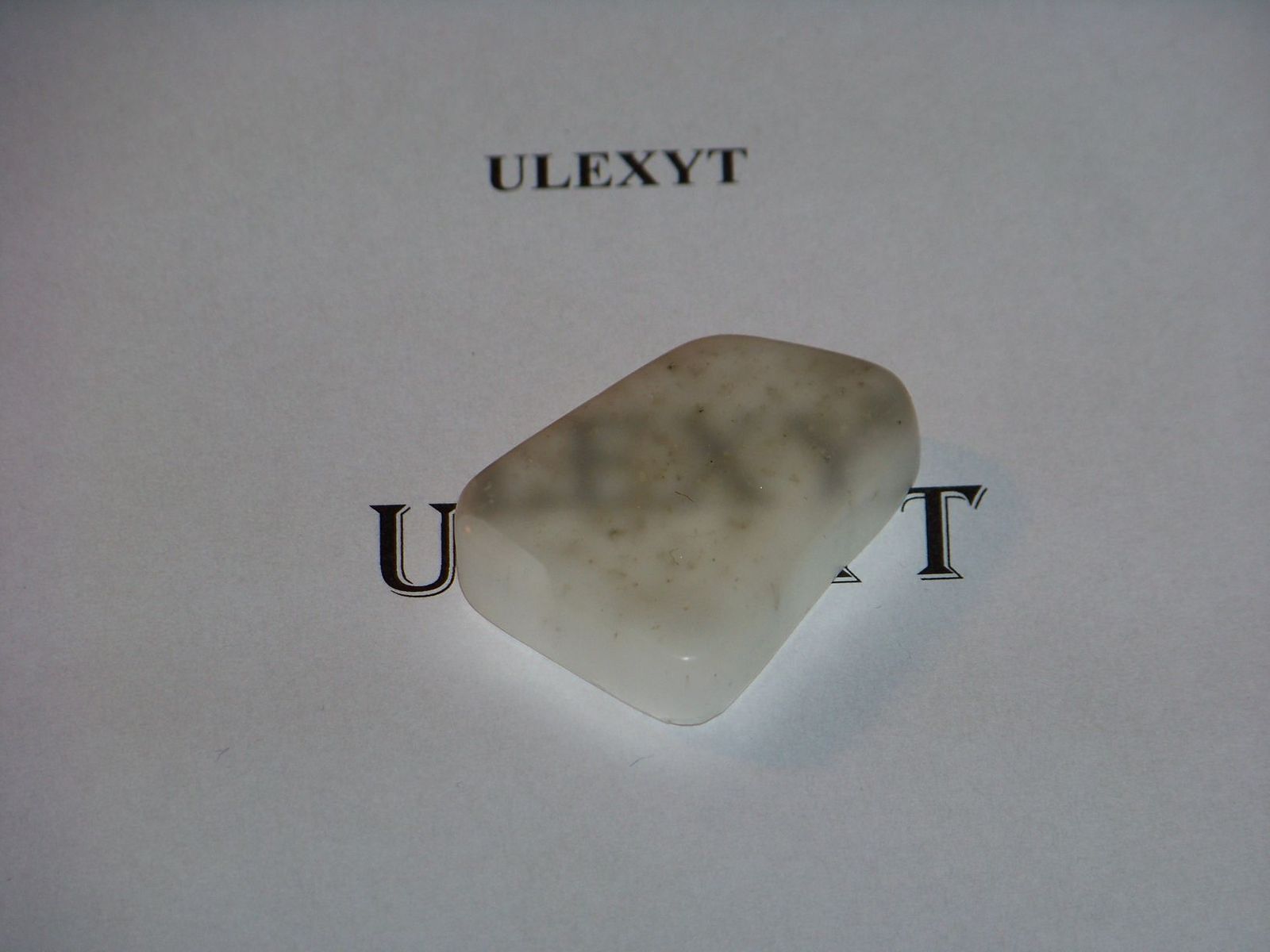 Polished ulexite demonstrating image transmission