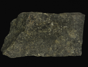 Dark gray coarse grained rock