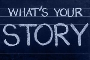 Text-What's Your Story written on a chalkboard