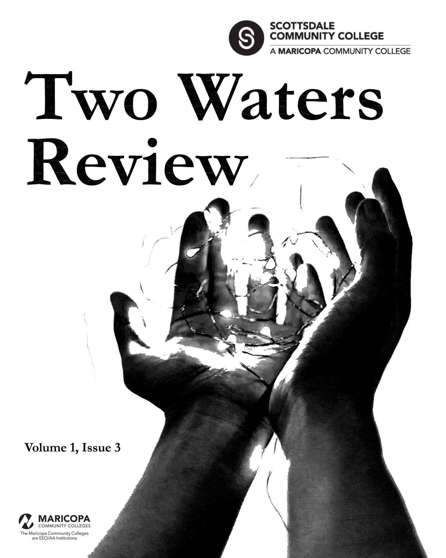 Two Waters Review 1.3 cover image showing hands holding up lights