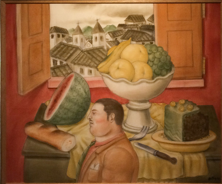 Still life painting: Man in front of an array of fresh fruits and a landscape in the background.