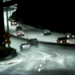 vehicles on a rainy highway