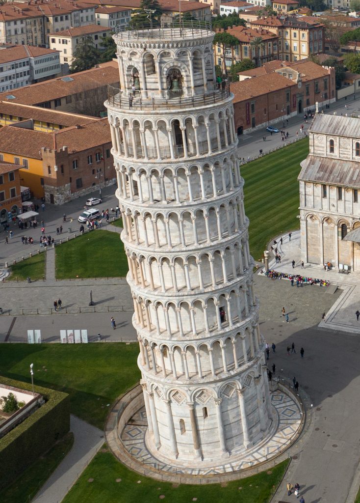 A photograph of the Leaning Tower of Pisa taken from the air
