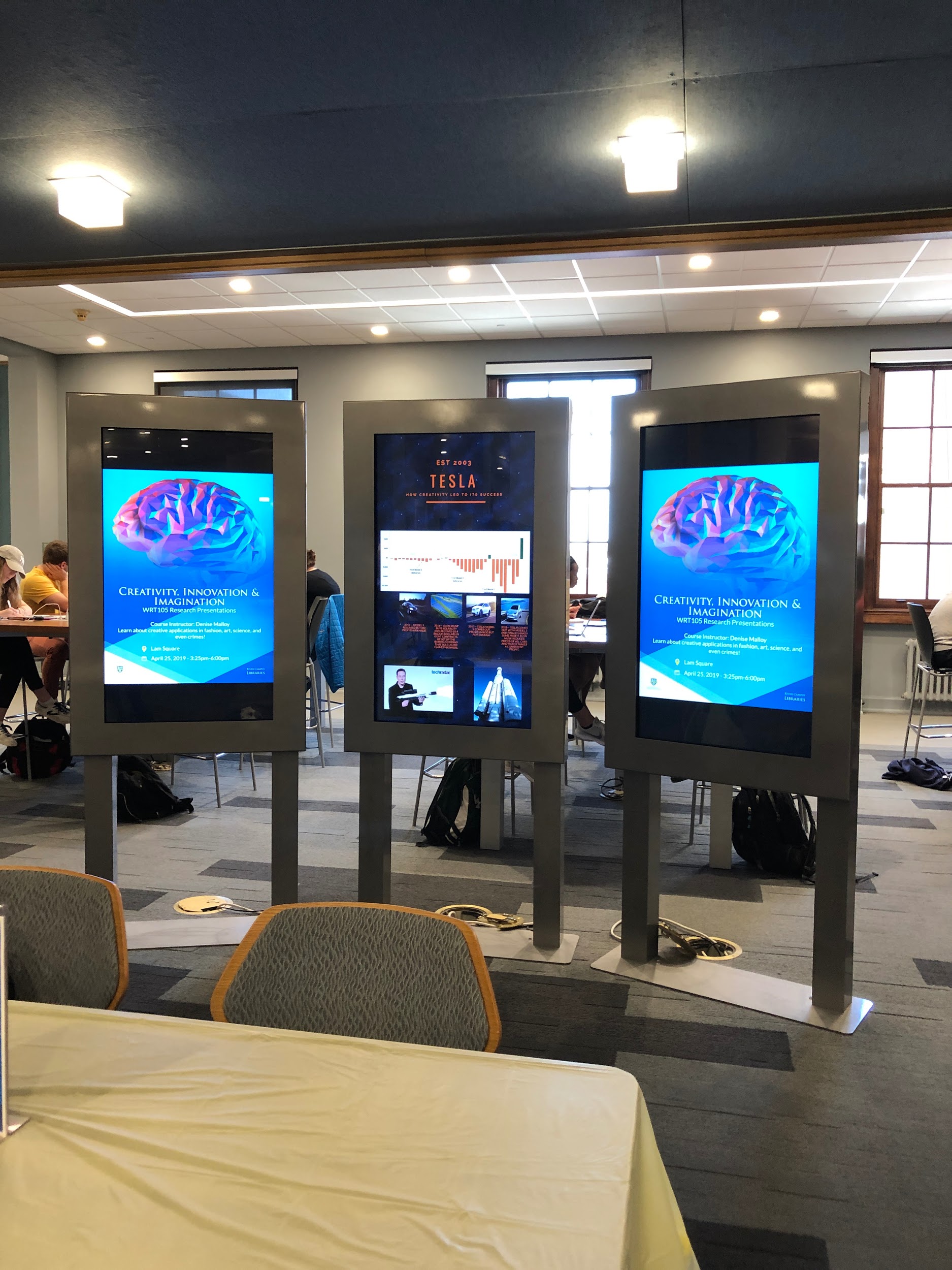 three digital display signs outside the pop up session