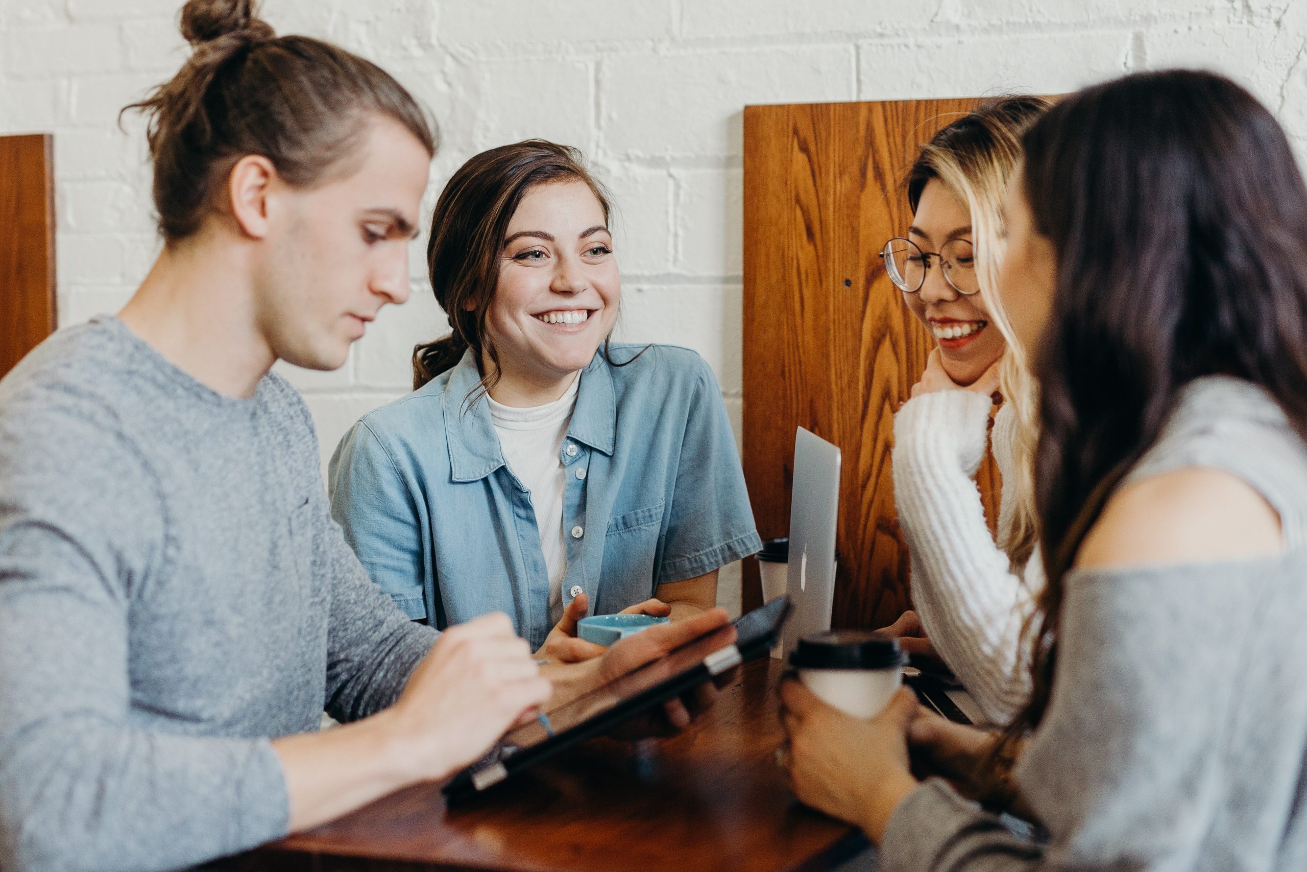 A group of students are discussing something