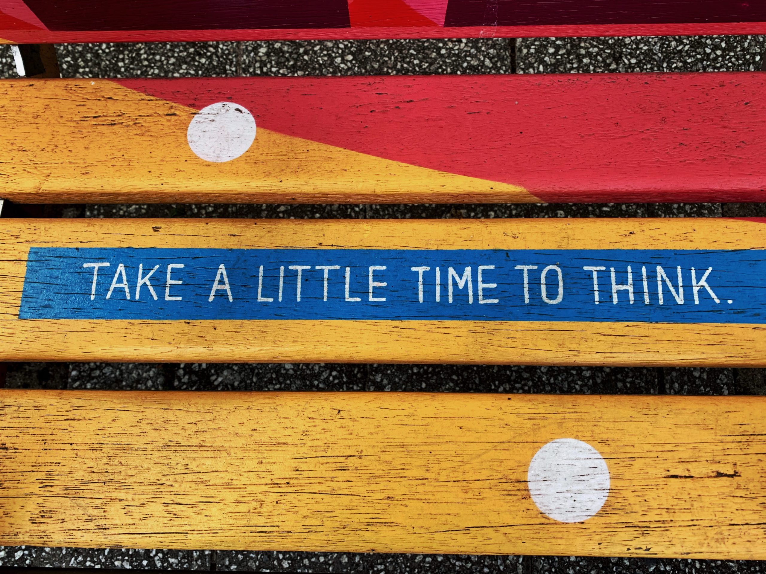 On painted to seat in Southampton Hampshire, a message inspiring people just to sit down and take a little time to think.