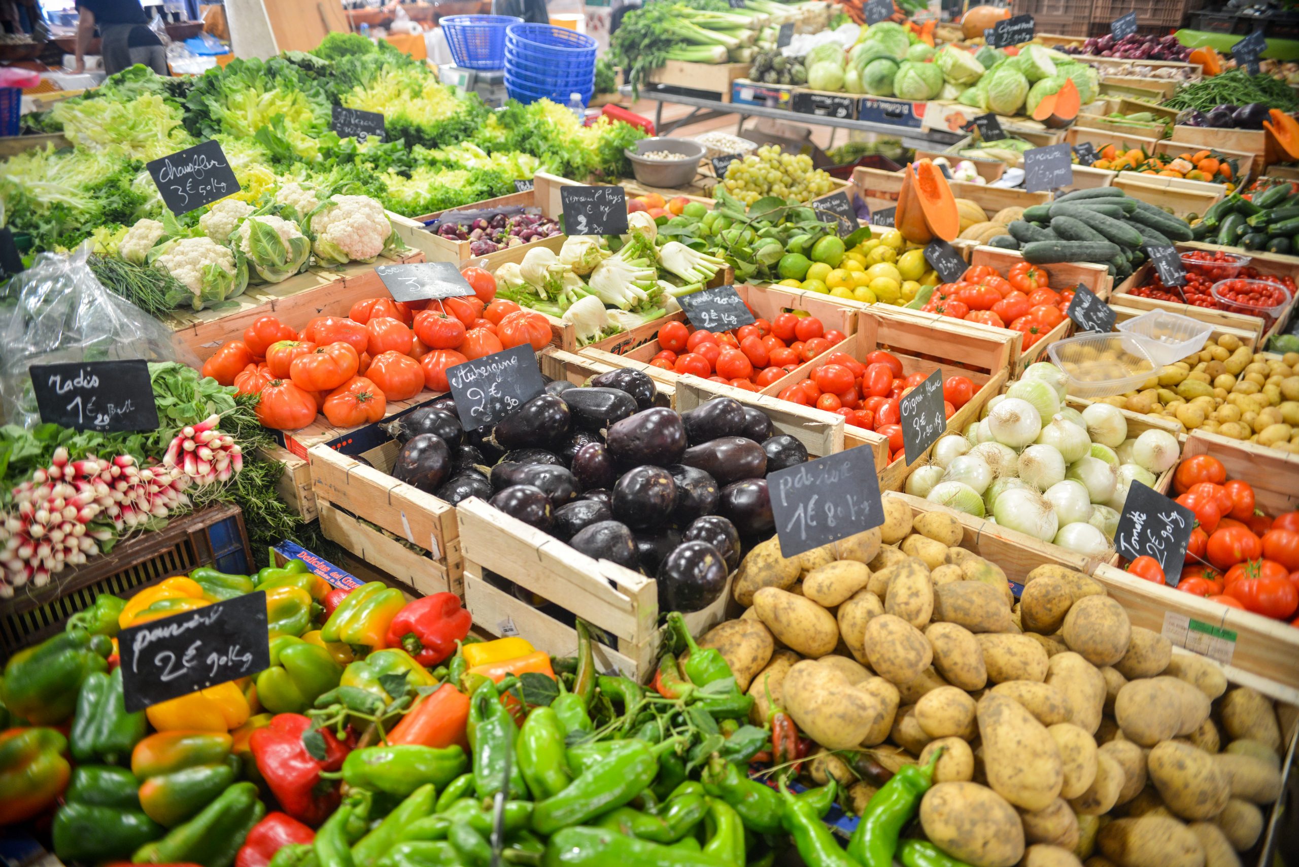 Image showing vegetables in labeled bins at a market