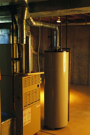 picture of a water heater tank in a basement