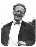Photo of Erwin Schrödinger wearing glasses, a bowtie, and jacket