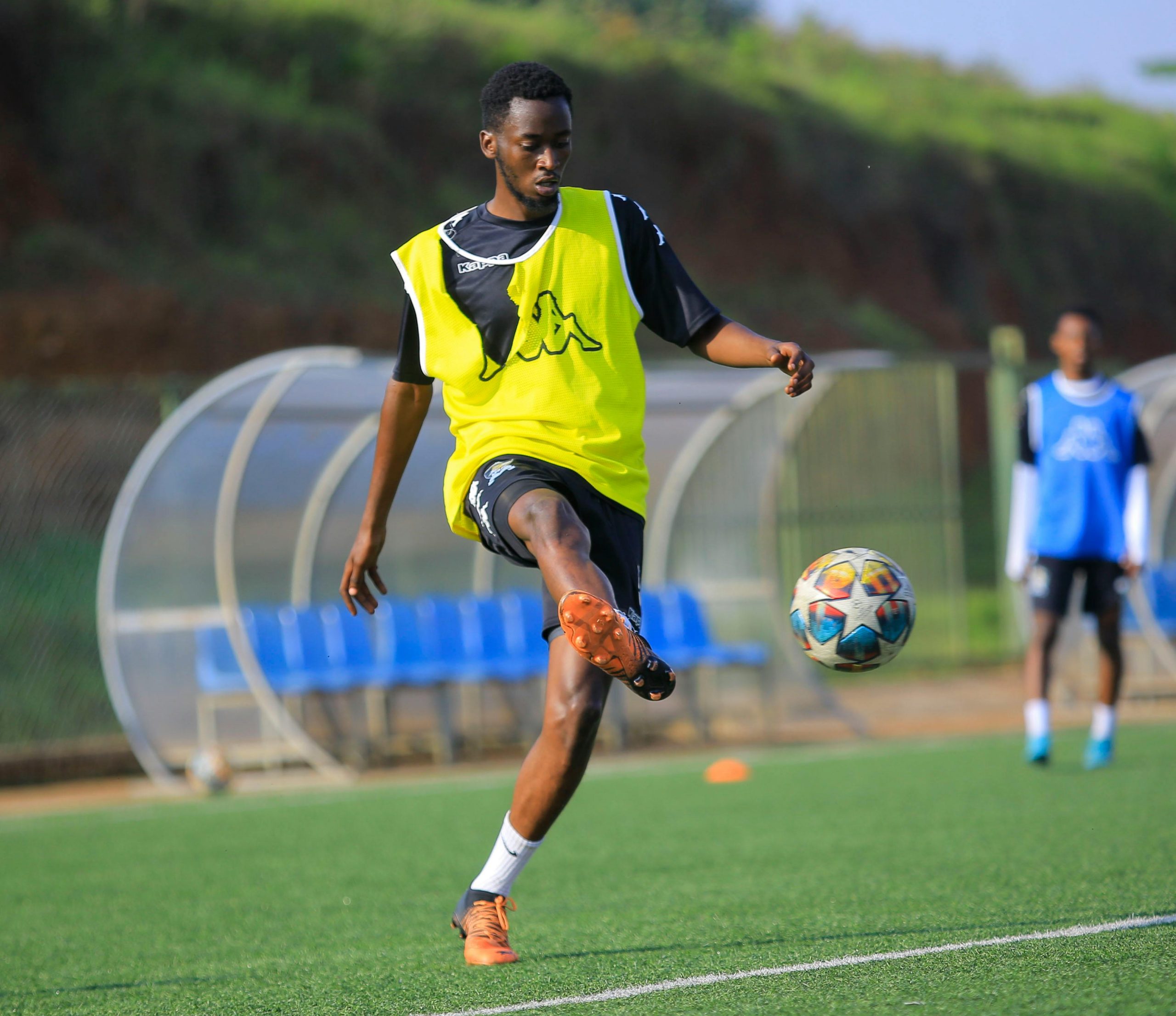 Man in Black and Yellow Jersey Playing Soccer