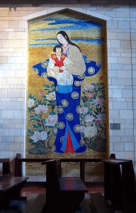 Japanese mosaic of Madonna and Child in the upper-level chapel of the Church of the Annunciation, Nazareth, Israel. Both Madonna and child have uniquely Japanese features and are wearing traditional Japanese costume.