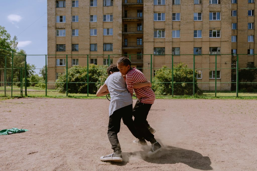 Boys fighting in school yard
