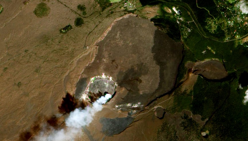 Aerial view of the Kilauea caldera. The caldera is about 4 km across, and up to 120 m deep. It encloses a smaller and deeper crater known as Halema’uma’u.