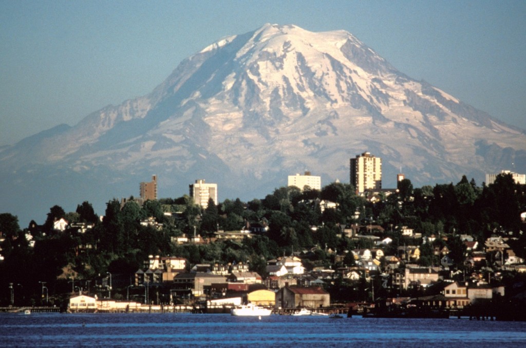 Figure 15.20 Mount Rainier, Washington, from Tacoma. [By Lynn Topinka, US Geological Survey, http://en.wikipedia.org/wiki/Mount_ Rainier#/media/File:Mount_Rainier_over_Tacoma.jpg]